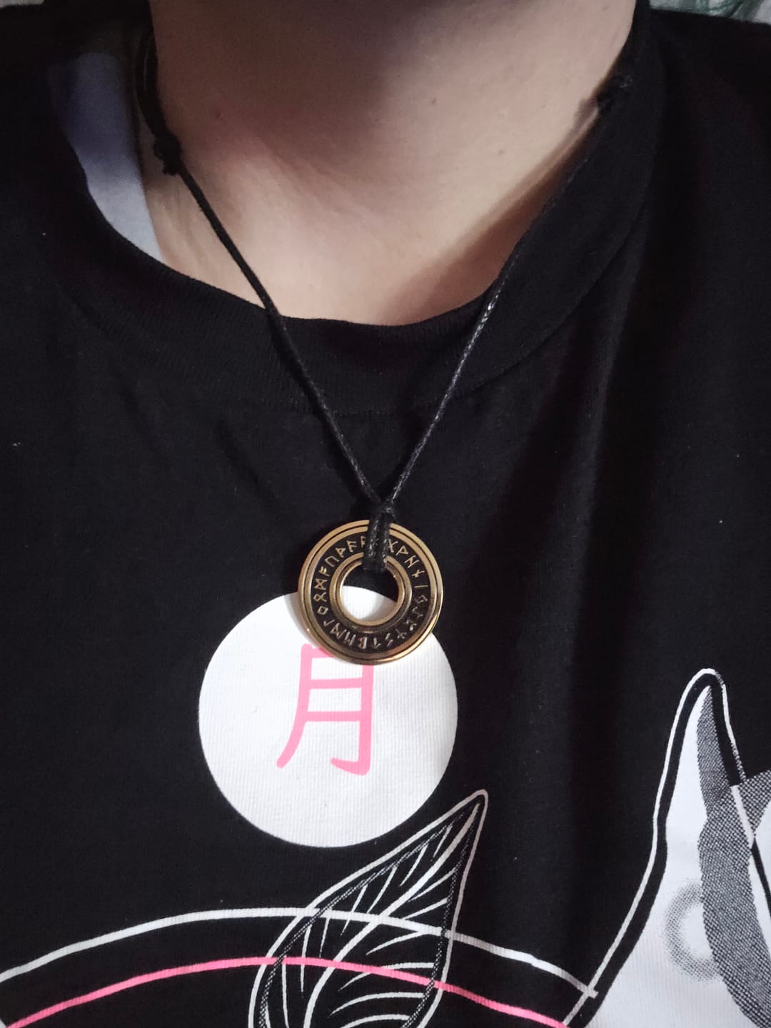 Customer photo review of Runed Coin Pendant