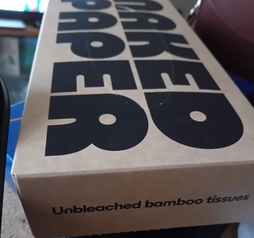 Reviewer's close-up of the cardboard box for Unbleached Bamboo Tissues.