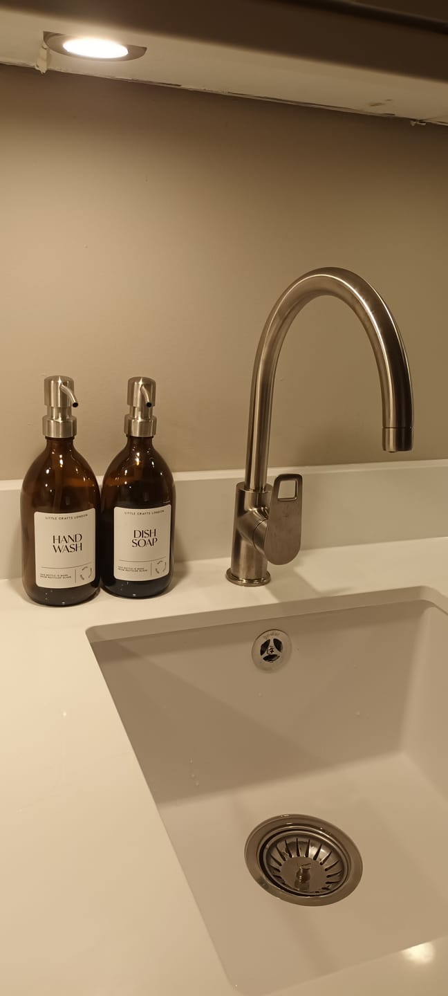 Customer photo review of 500ml Amber Glass Bottle with Metal Pump White Label
