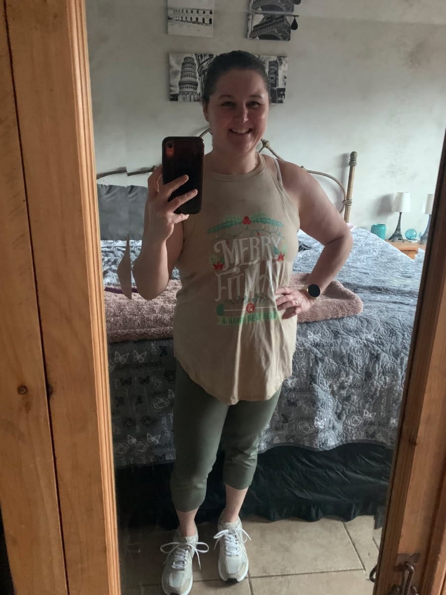 Customer photo review of Merry Fitness and Happy New Rear Rocker Tank