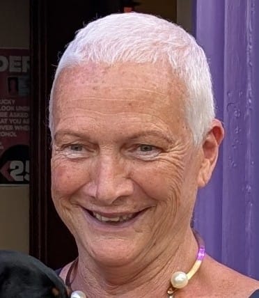 Reviewer with short, white hair before using the Instant Dye Shampoo.