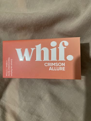 Customer's photo of the pink packaging for their Whif Crimson Allure perfume.
