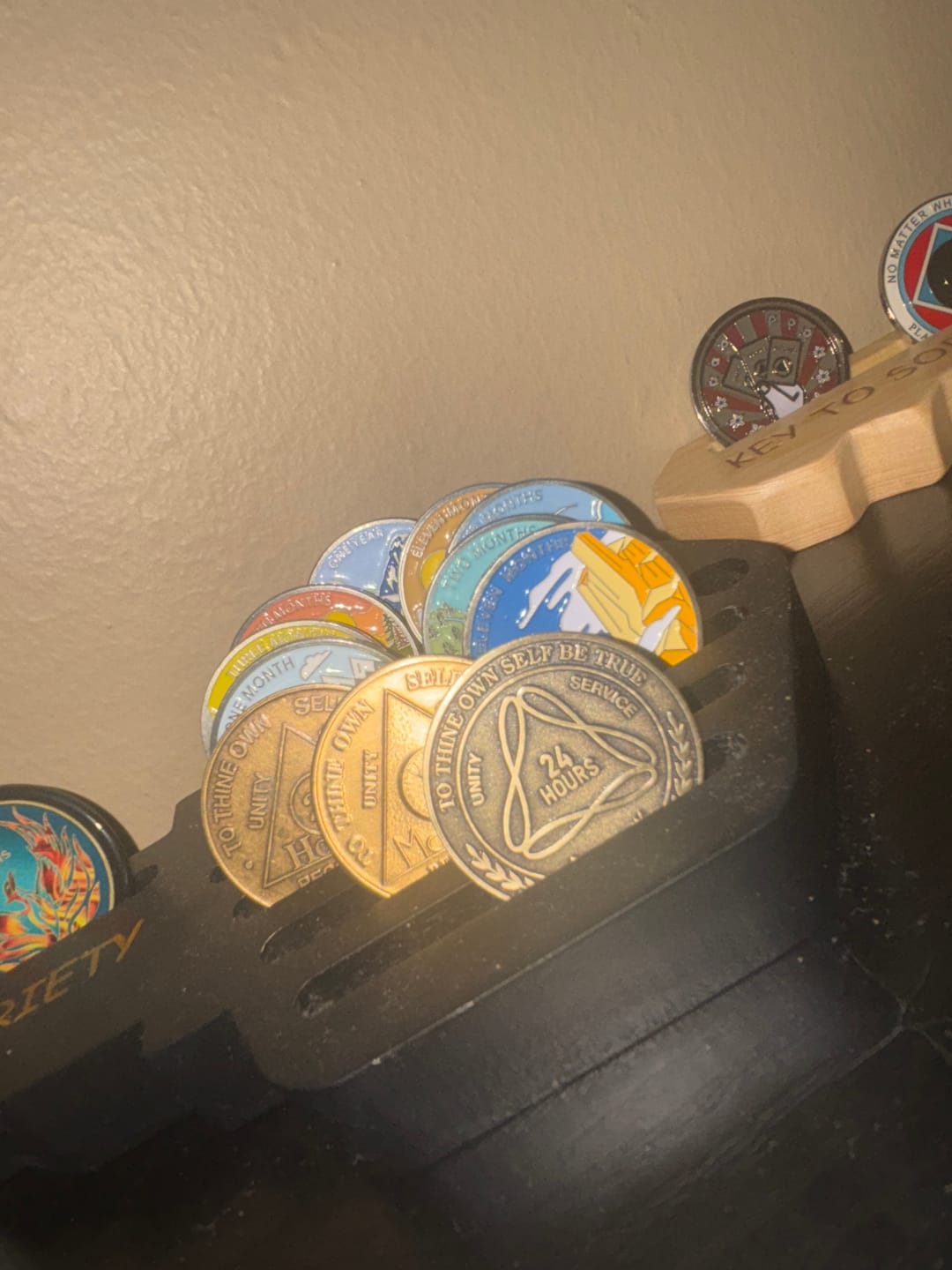 Customer photo review of 1 to 50 Year Bronze AA Meeting Chips - Sobriety Mint Infinity Triangle Recovery Medallions/Coins