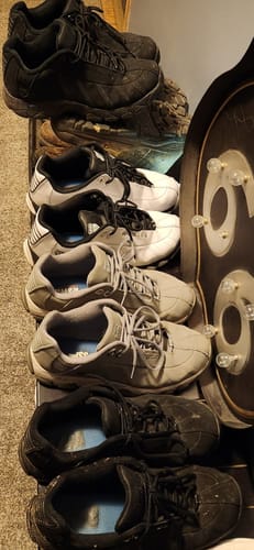 Customer's collection of ST329 CMF sneakers lined up, showing multiple pairs in black, white, and grey.