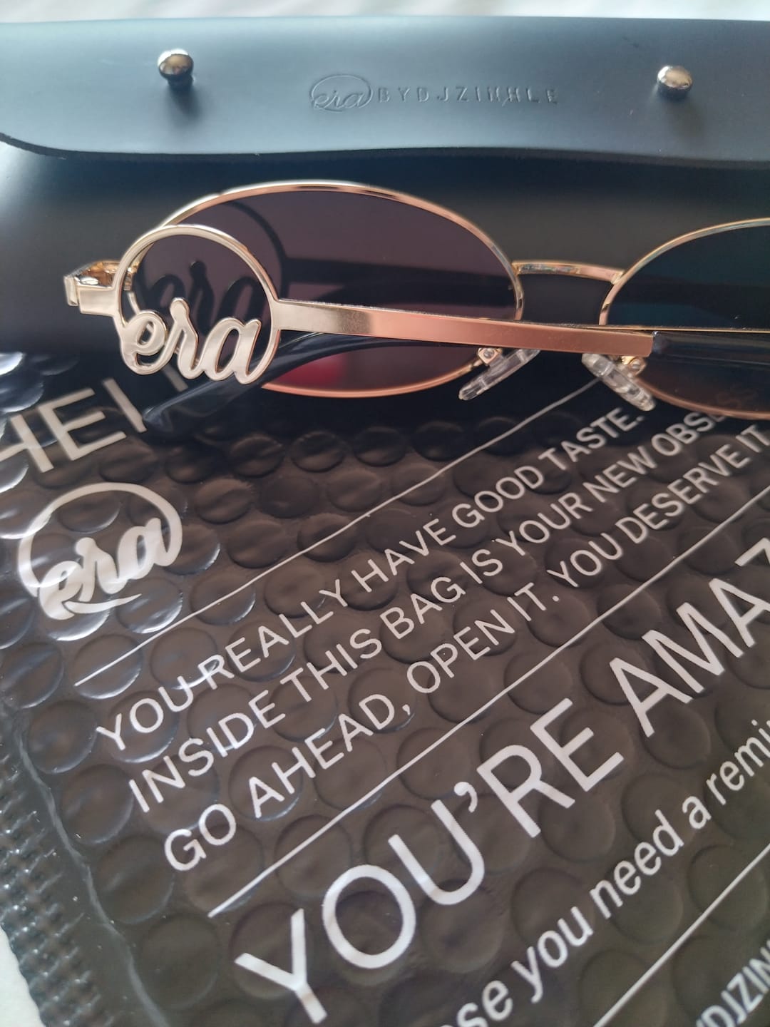 Customer photo review of Muse Logo Sunglasses – Gold Edition