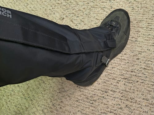 Customer showing the secure fit of the black Rocky Mountain High Gaiters II over their hiking boot.