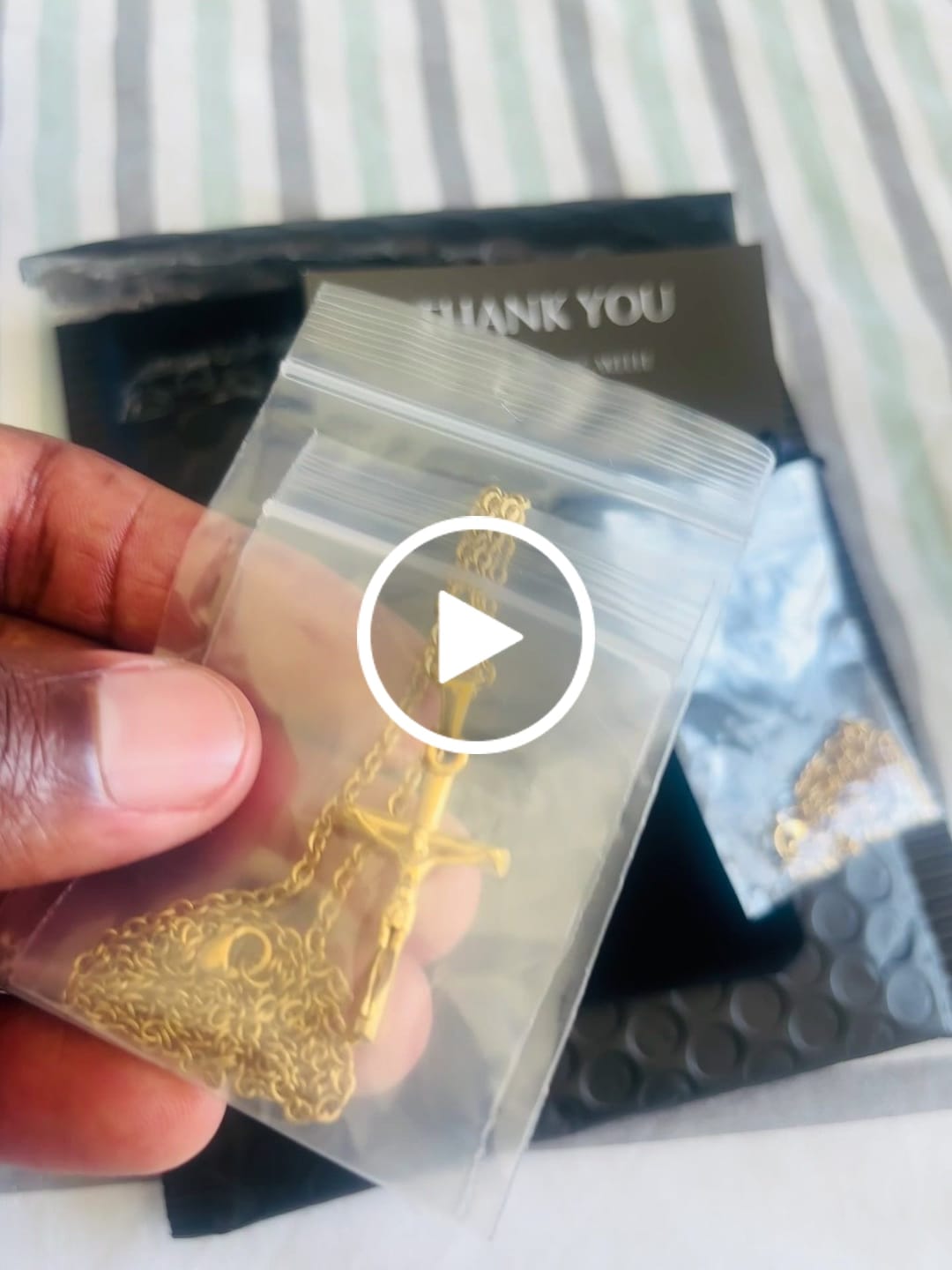 Customer video review of Gold crucifix necklace