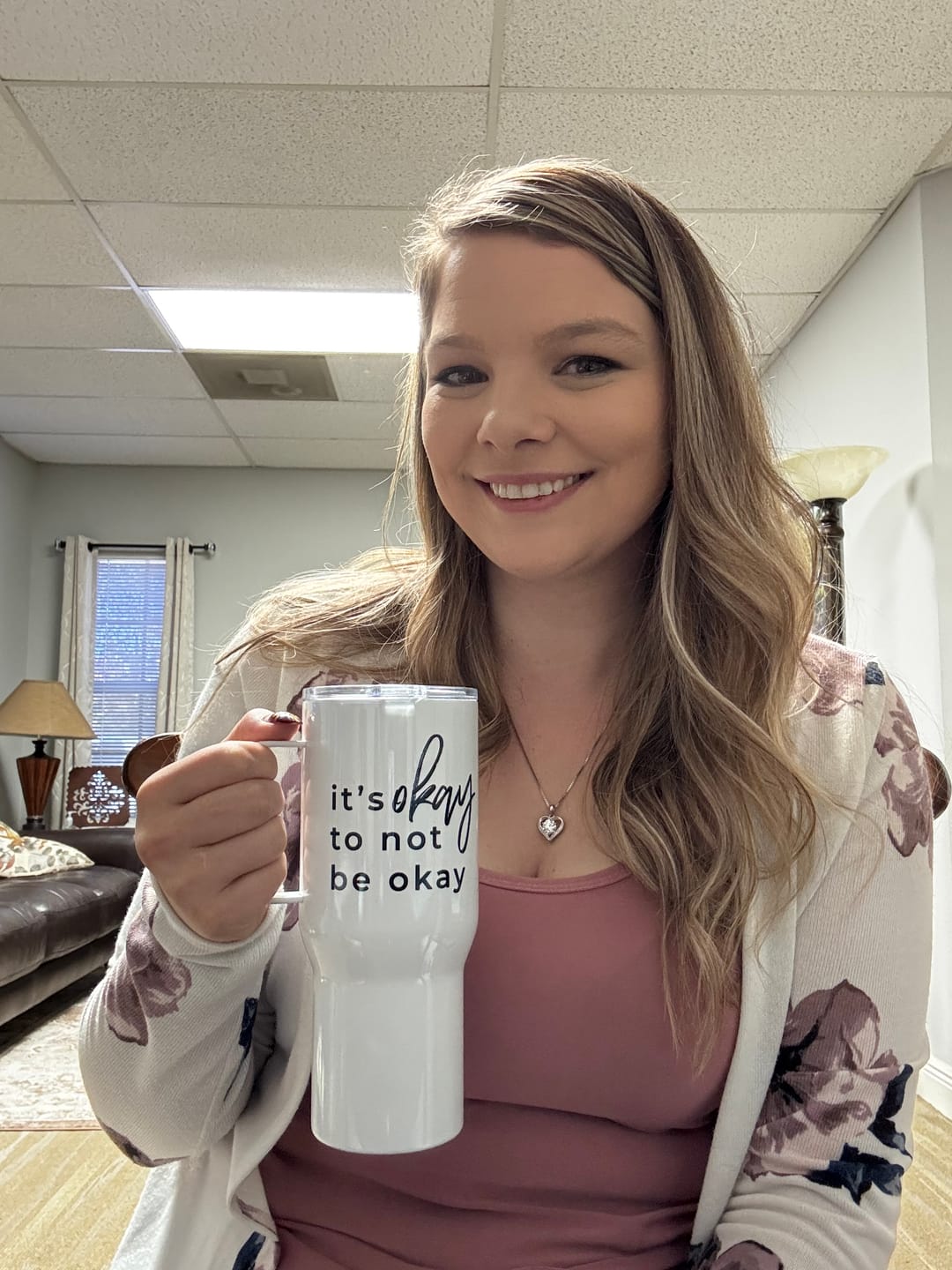 Customer photo review of It's Okay To Not Be Okay Travel mug with a handle