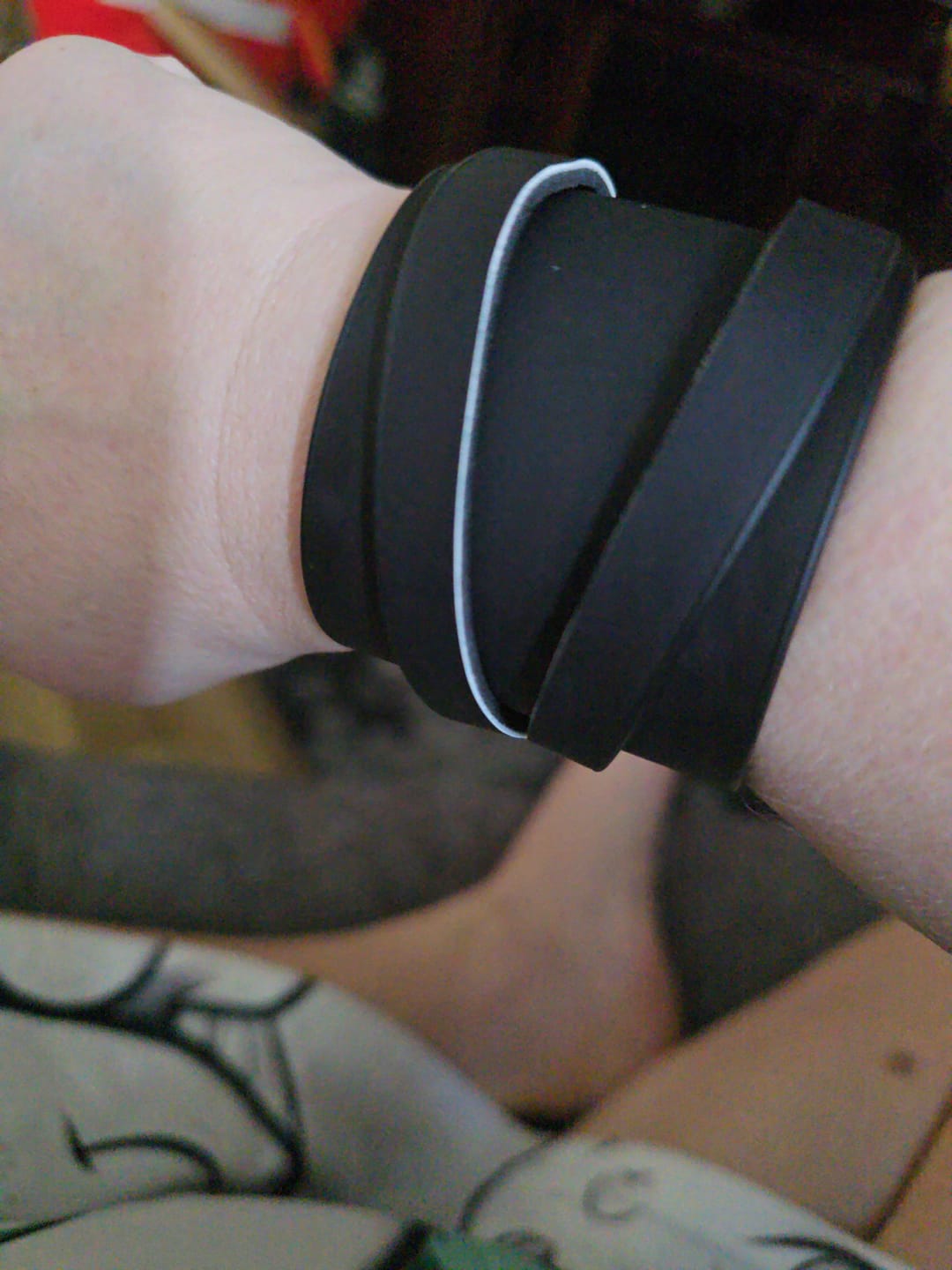 Customer photo review of Unisex Color-Changing Leather Dual-Wear Bracelet-Black to Skull (Heat Reactive)