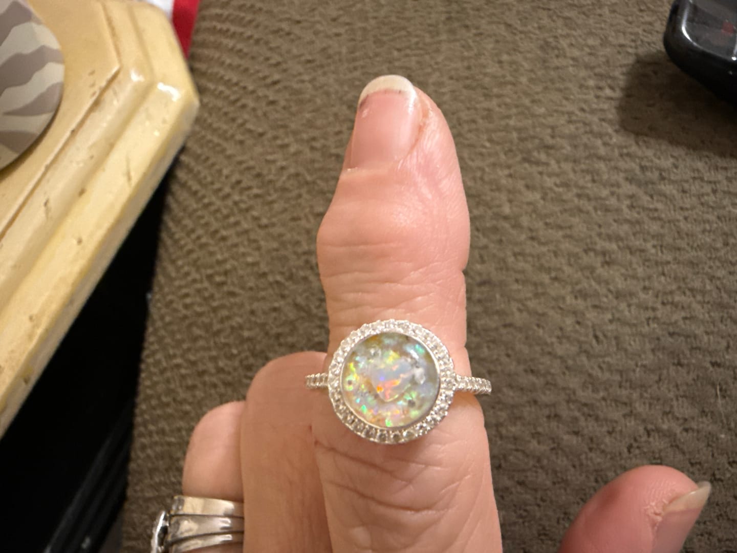 Customer photo review of Bedazzled Circle with Heart Opal Cremation Ring