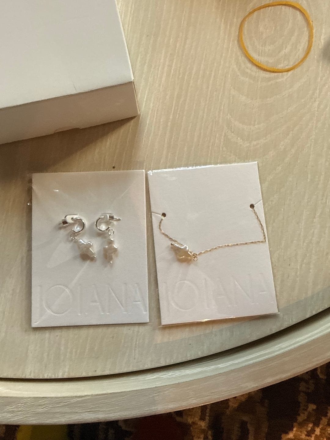 Customer photo review of Mini Pearl Cross Necklace