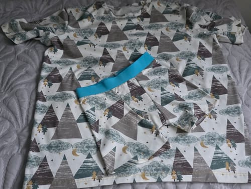 Customer's finished t-shirt and underpants made from the patterned Night Forest Cotton Jersey Fabric.