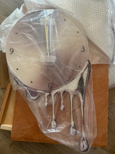 Customer photo review of Melting wall clock