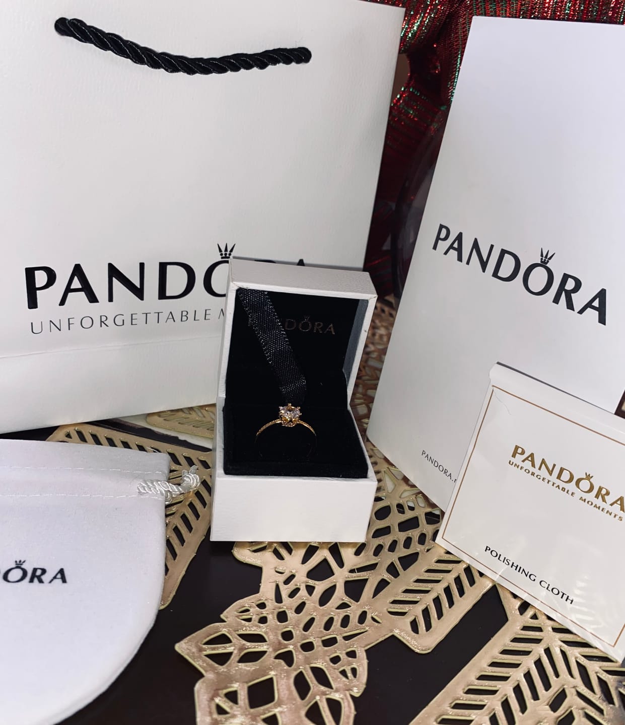 Customer photo review of ANILLO COMPROMISO PANDORA DORADO CORONA TRANSPARENTE + KIT DE REGALO