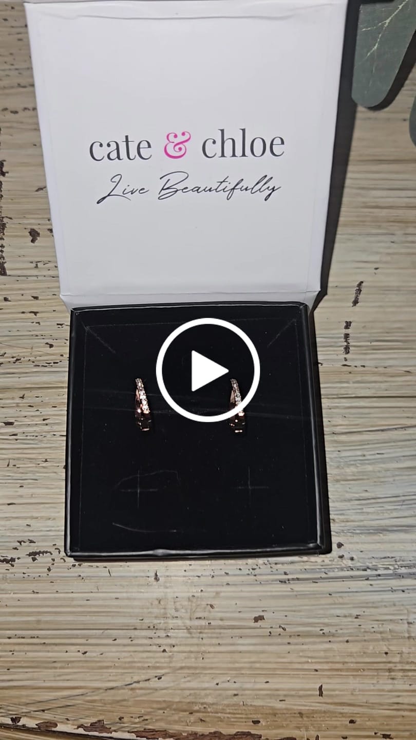 Customer video review of Amaya 18k White Gold Plated 16mm Twisted Hoop Earrings with Swarovski Crystals