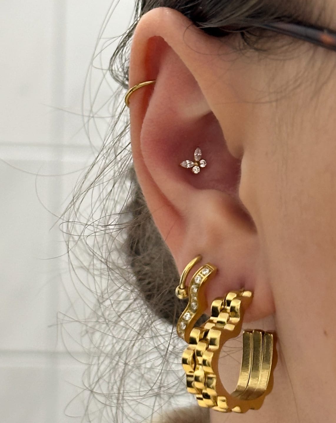 Customer photo review of Butterfly Piercing | Titan