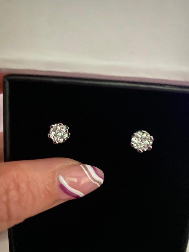 Customer photo review of Remy 18k White Gold Plated Stud Earrings with Heart Accents and Swarovski Crystals