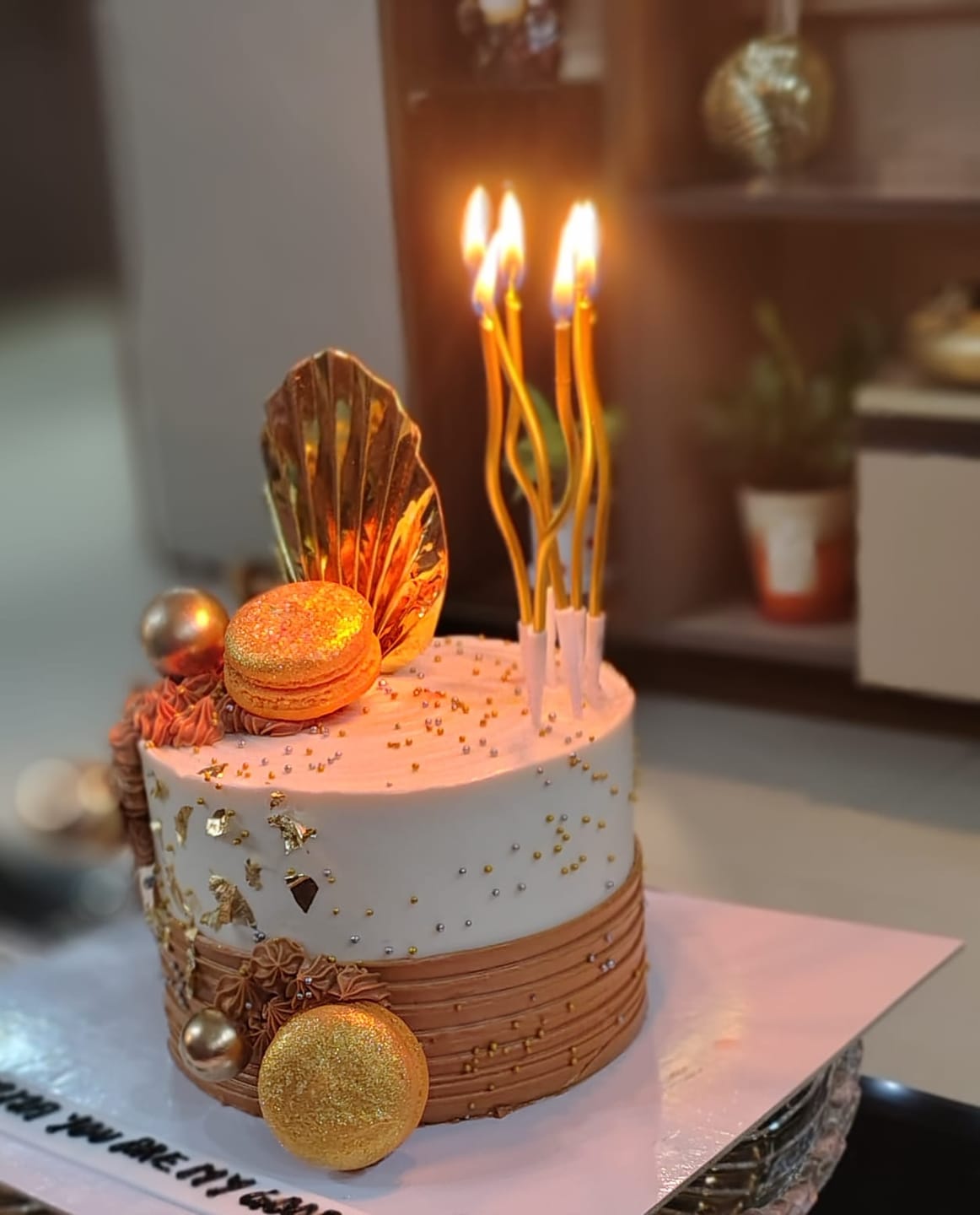 Customer photo review of Golden cake for boyfriend birthday