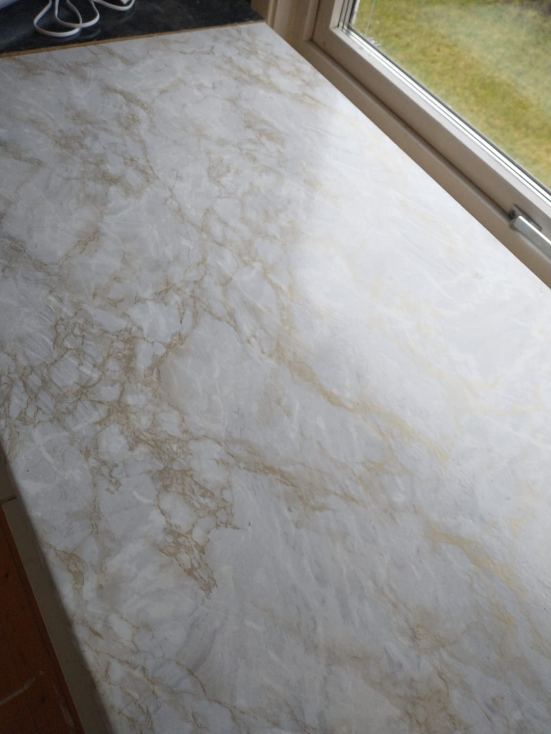Customer photo review of Cortes marmor gold kontaktplast