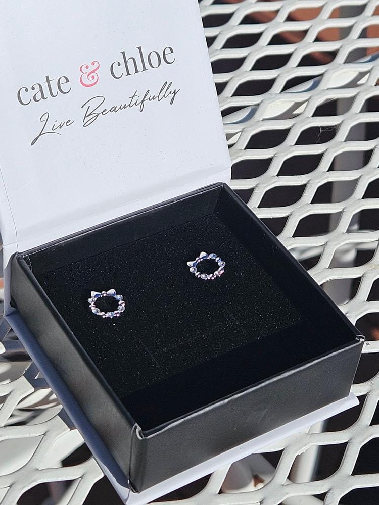 Customer photo review of Edith 18k White Gold Plated Silver Ribbon Stud Earrings with Swarovski Crystals