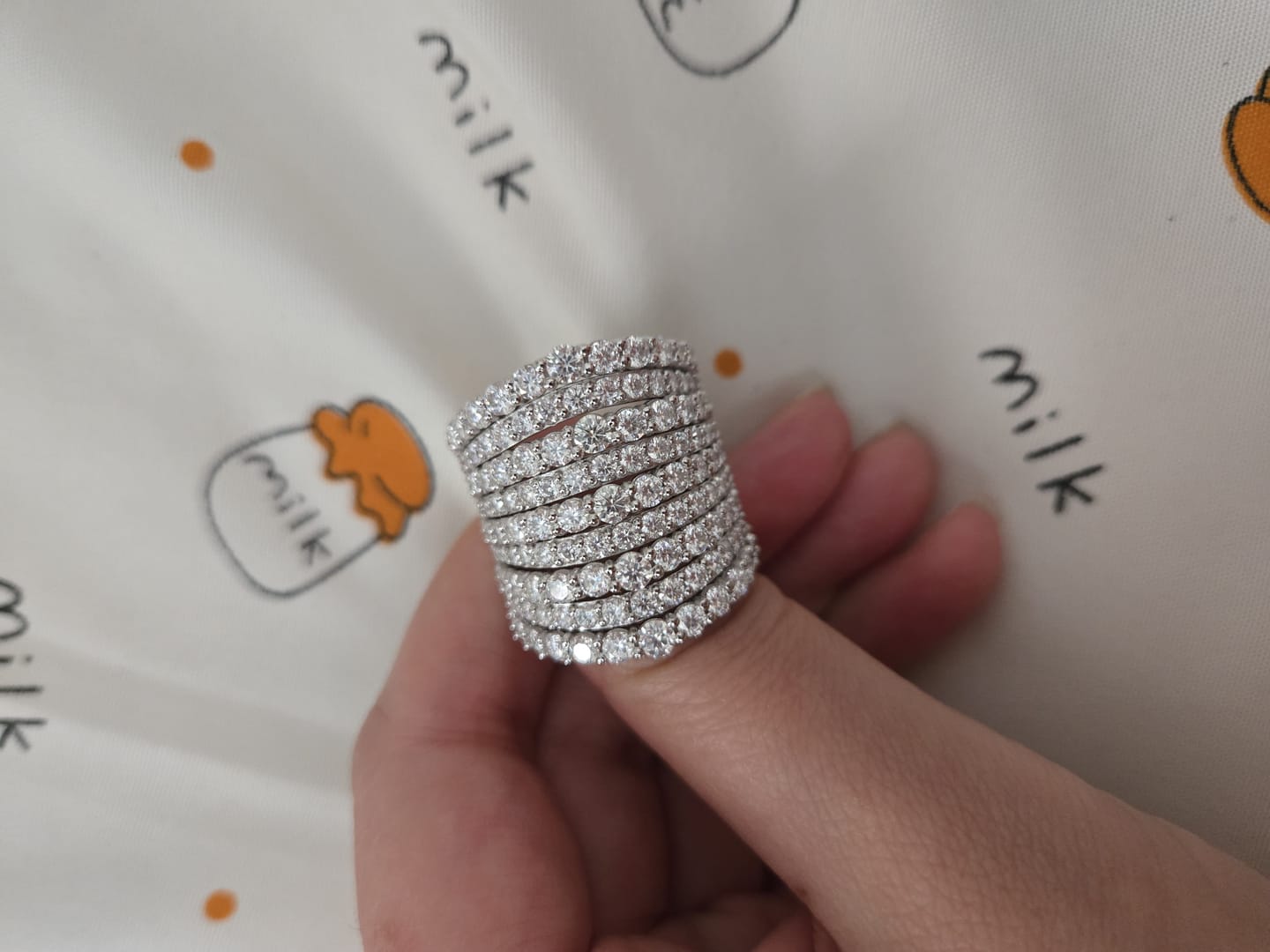 Customer photo review of Dazzling 925 Sterling Silver Pave Round Cut Wide Band Wedding Ring
