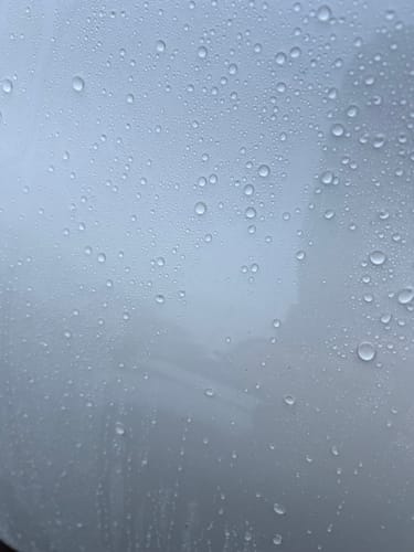 Customer's close-up of impressive water beading on a car after using the Ceramic Shampoo.