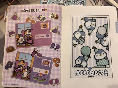 Reviewer's decorated planner spread using cute Party Penguins stickers for a December 2025 title page.