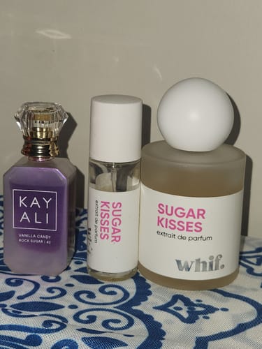 Reviewer's Sugar Kisses perfume bottles shown next to the Kayali fragrance for a side-by-side comparison.