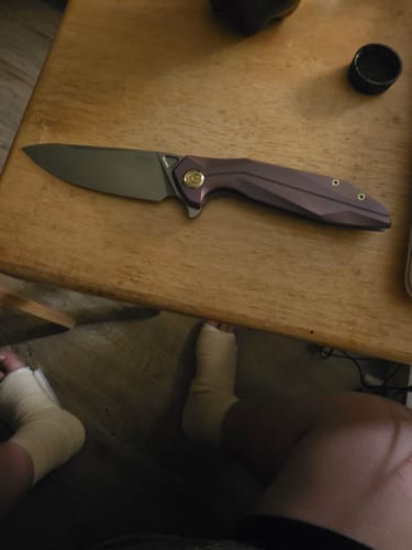 Customer photo review of Kubey Nova Titanium Frame Lock EDC Knife Purple 14C28N 3.66"