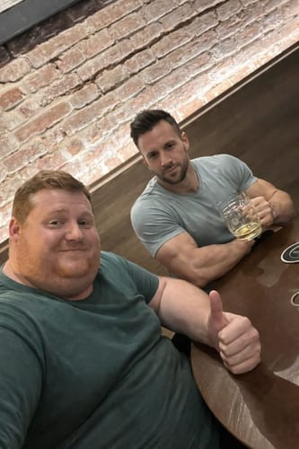 A satisfied customer gives a thumbs-up in a personal photo for their Complex Pill box review.