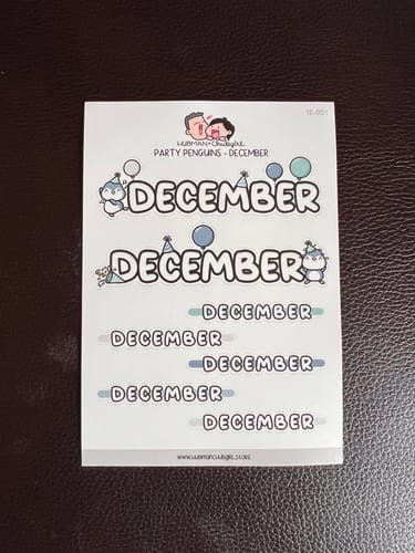 Customer's Party Penguins sticker sheet for December, showing cute penguins with party hats and balloons.