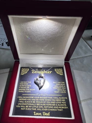 Customer's 'To My Daughter' gift set in its open mahogany box, with the LED light illuminating the heart necklace and card.
