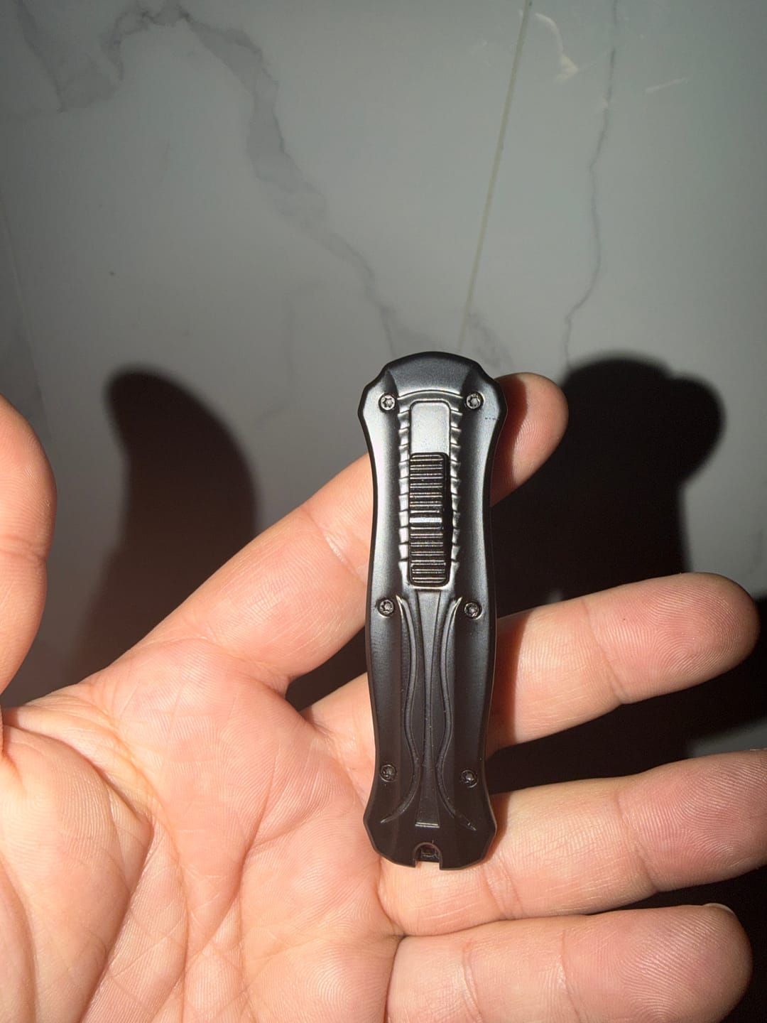 Customer photo review of VT Black Rocket Mini OTF Knife