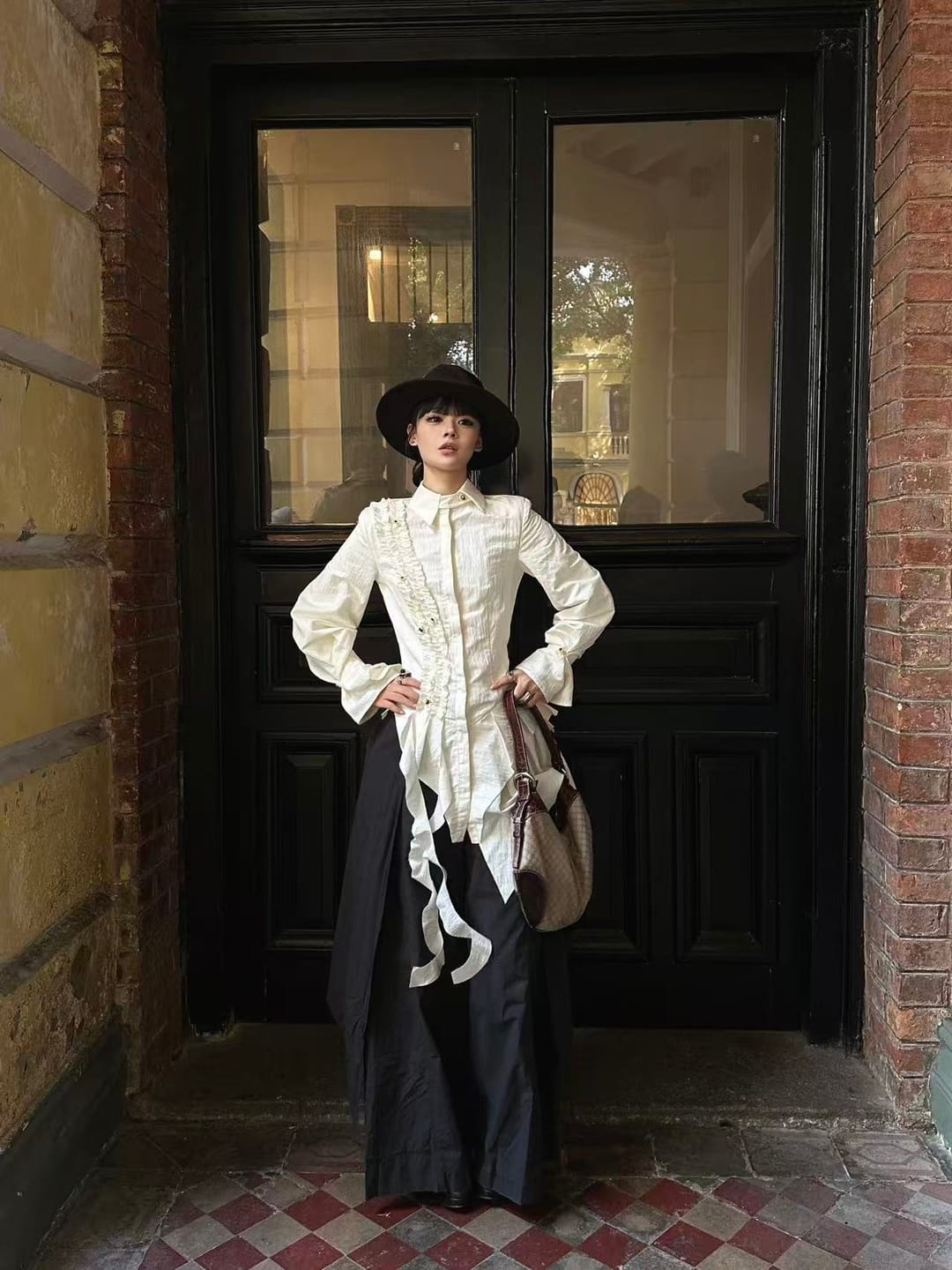 Customer photo review of INDULGE Asymmetric Ruched High-Neck Shirt with Sculptural Draped Panels