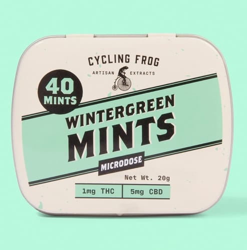 Reviewer's tin of Cycling Frog Wintergreen Mints, showing it contains 40 microdose mints with 1mg THC.