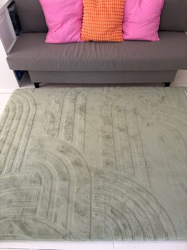 Customer's soft Pistachio Green Mellow Mat® Cloud Haven 3D rug in a rumpus room.