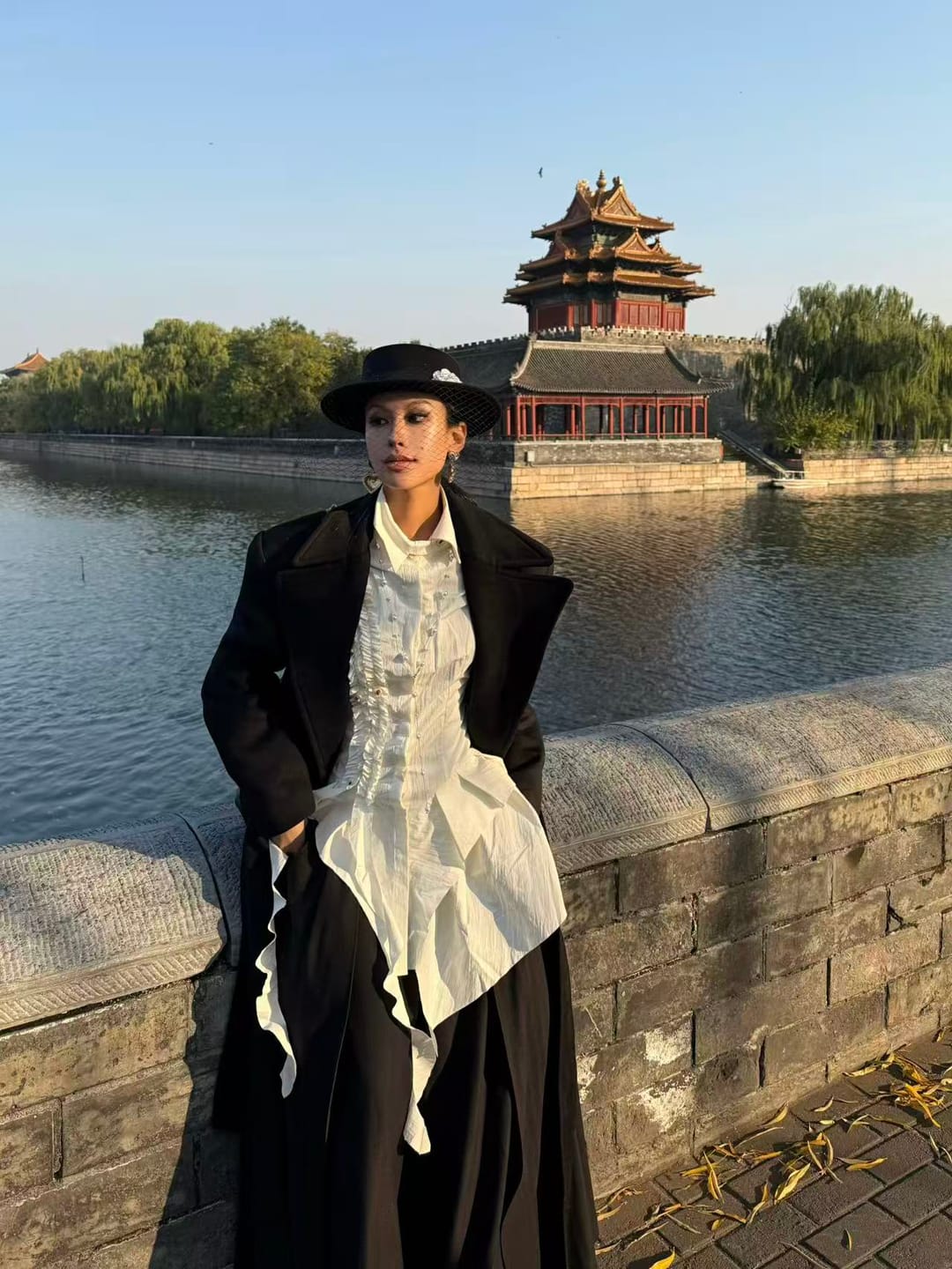Customer photo review of INDULGE Asymmetric Ruched High-Neck Shirt with Sculptural Draped Panels
