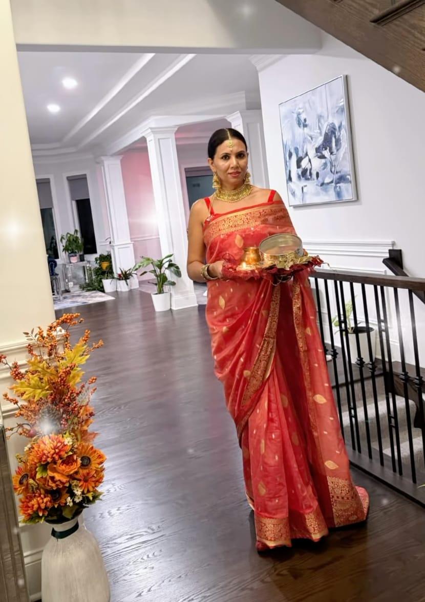 Customer photo review of Crimson Red Woven Banarasi Silk Saree with overall Butti