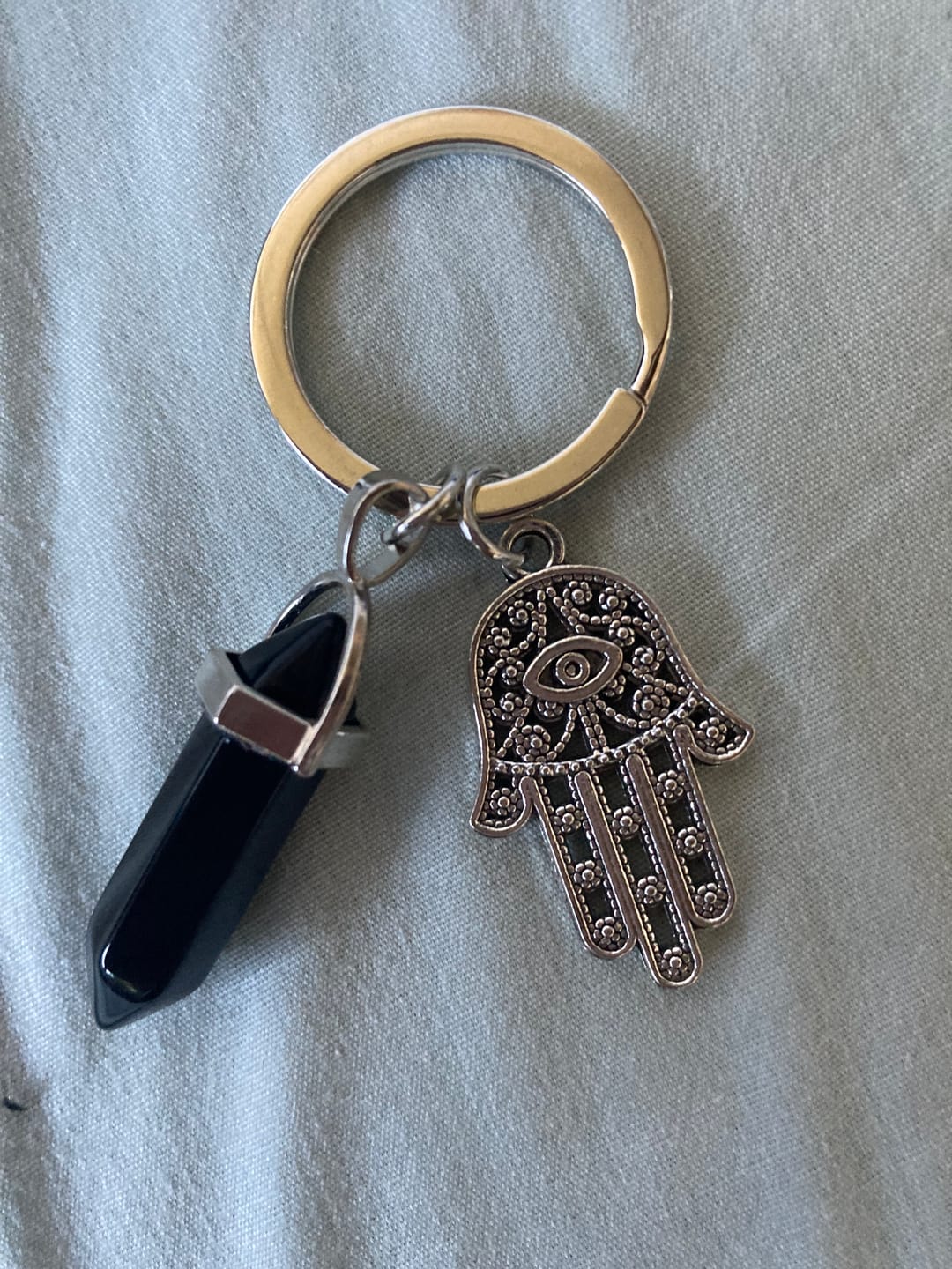 Customer photo review of Olivenorma Inspiring Hamsa Hand Crystal Keychain