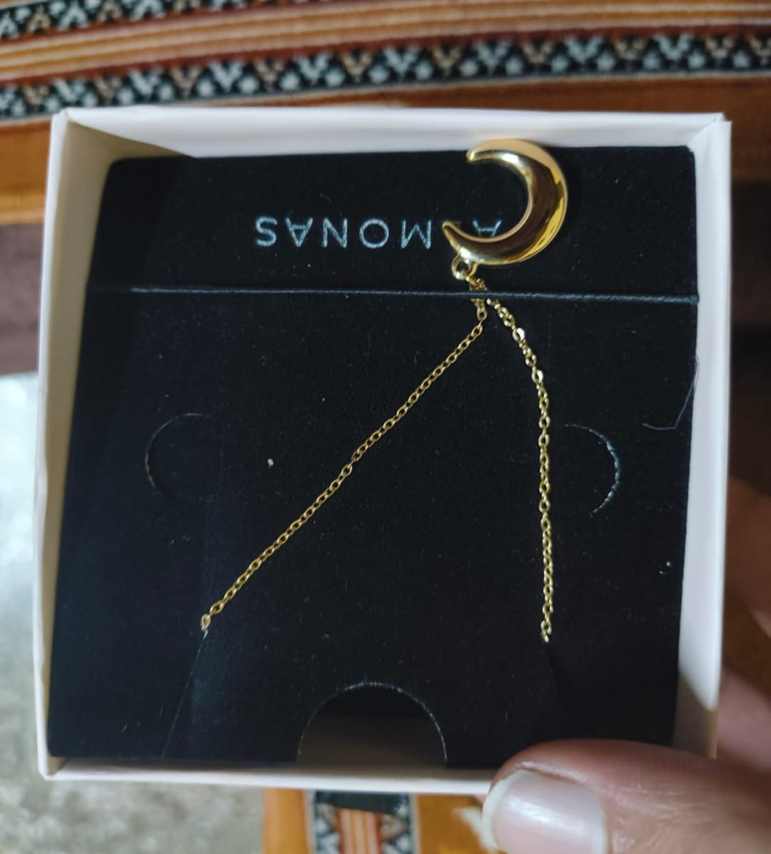 Customer photo review of Tiny Horn Necklace