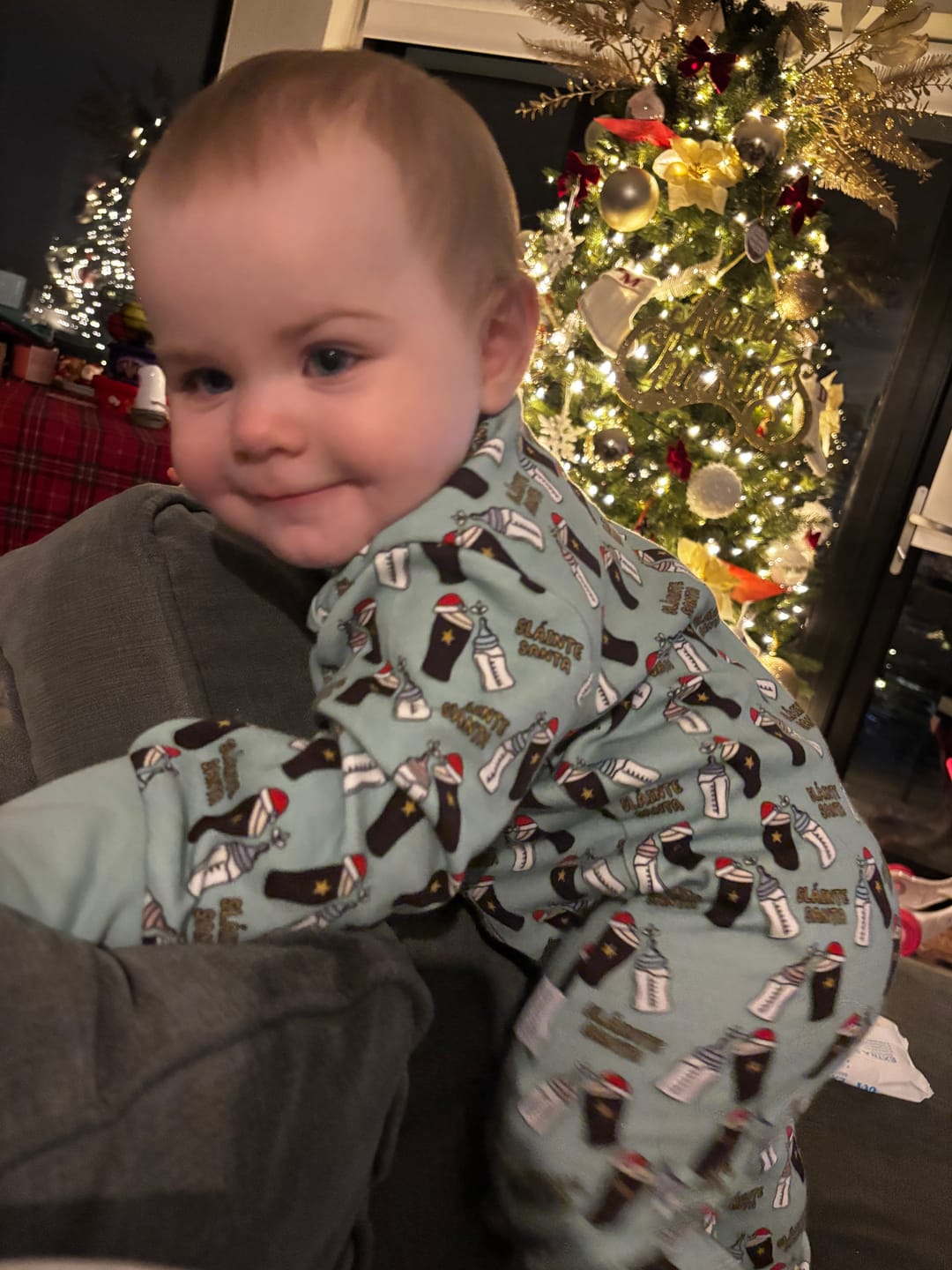 Customer photo review of Sláinte Santa Christmas Cheers Baby Onesie