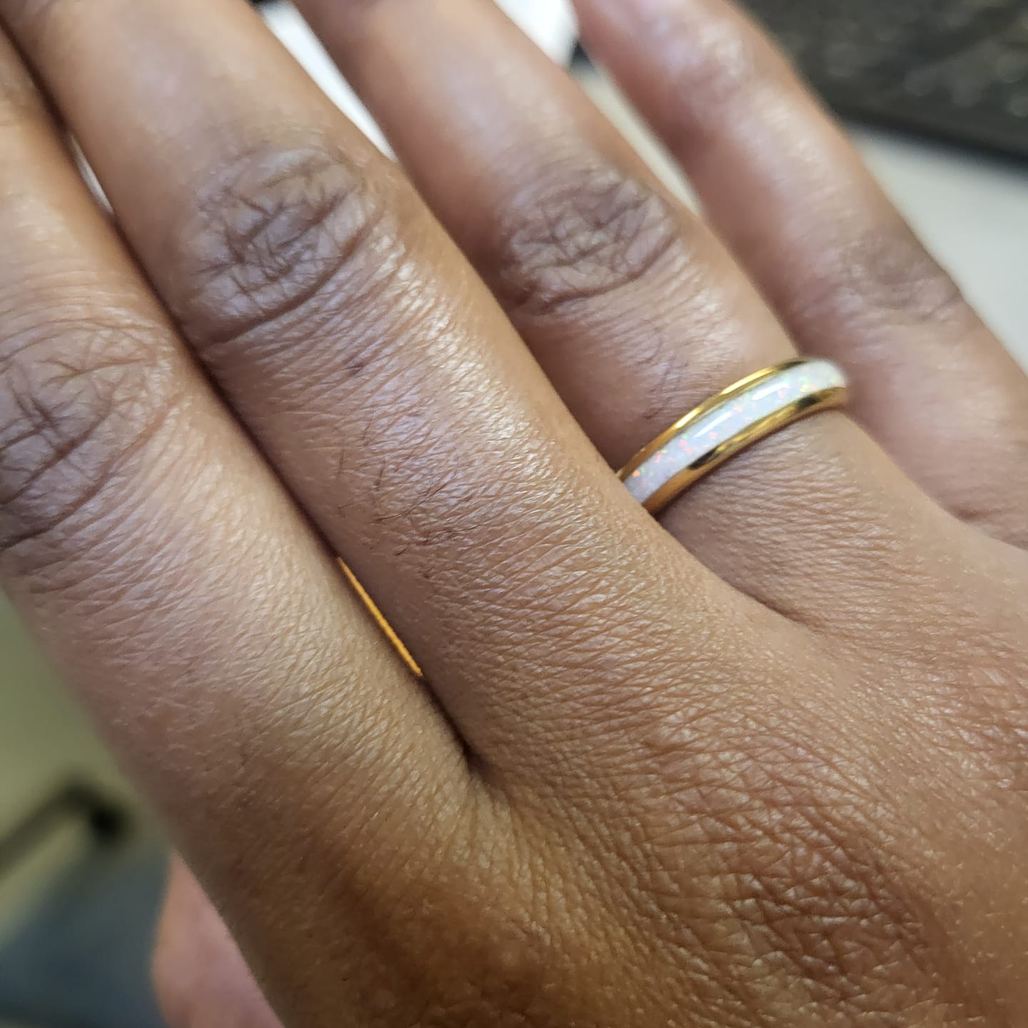 Customer photo review of The Golden White Opal 4mm Wonder Ring