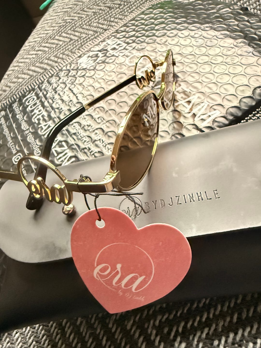 Customer photo review of Muse Logo Sunglasses – Gold Edition