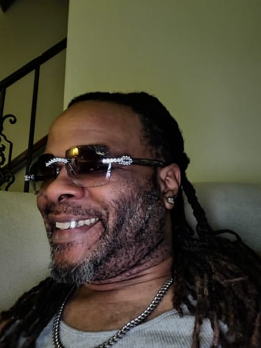Customer photo review of Iced out Rimless Sunglasses Detroit style Buffs 50 pointers