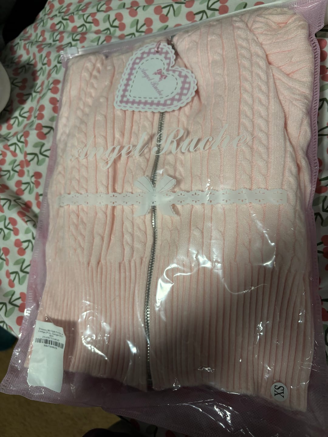 Customer photo review of Strawberry Milk Cable Knit Zip up Cardigan (Pink)