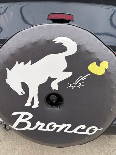 Customer photo review of Bronco Bucking a Duck with Bronco Wording Spare Tire Cover Jeep, Bronco, RVs and more