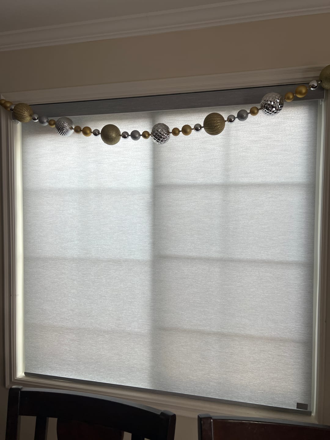 Customer photo review of SmartWings Motorized Light Filtering Roller Shades 70% Blackout Essential