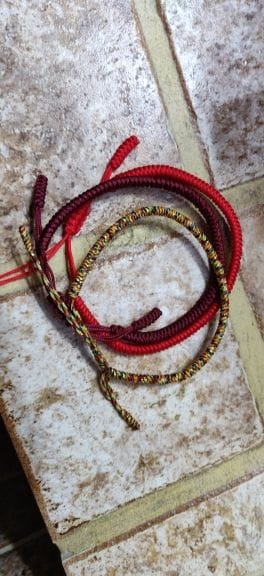Customer photo review of FuAttract Feng Shui Talisman Tibetan Buddhist Knot Lucky Rope Bracelet
