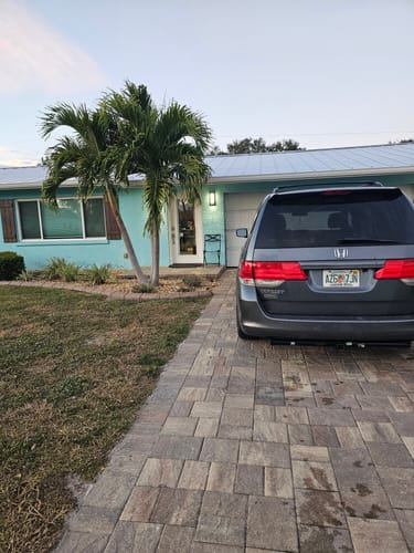 Customer's white front door with the Raise & Lower Blinds Glass Kit installed and blinds open.