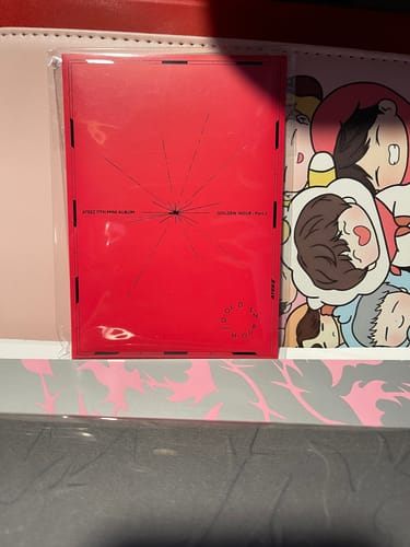 Customer's ATEEZ MYSTERY ALBUM, which is the red 'Golden Hour: Part.1' mini album, shown in its clear plastic sleeve.